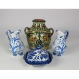 A pair of attractive blue and white Jugs, two blue and white Vegetable Dishes & Covers,