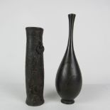A tall 19th Century Japanese bronze Vase, of bulbous form, decorated with fish,