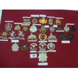 BOARD OF ASSORTED CAP BADGES INCLUDING LINCOLNSHIRE