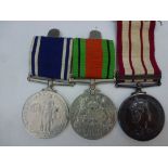 NAVAL GENERAL SERVICE MEDAL AWARDED TO B.S.ADAMS WITH NEAR EAST CLASP, DEFENSE MEDAL AND EXEMPLARY