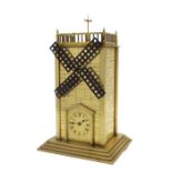 Novelty brass mantel timepiece in the form of a windmill, the 2" chapter ring inset into a doorway