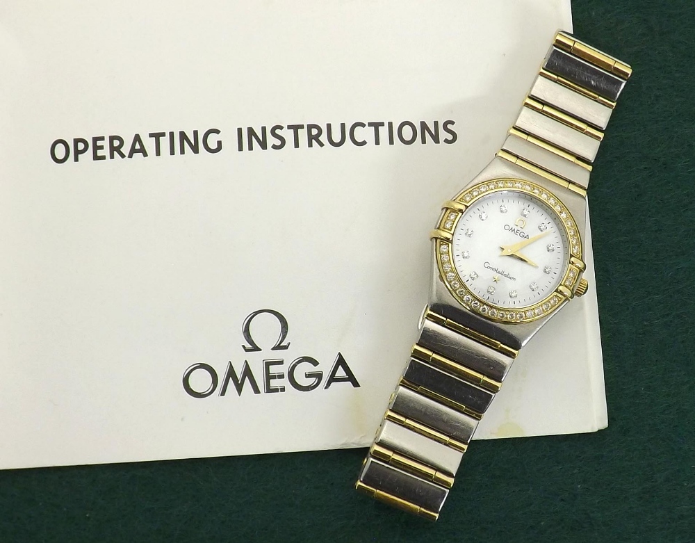 (600184-1-A) Omega Constellation gold and stainless steel diamond set lady's bracelet watch, circa