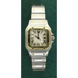 (575010379) Cartier Santos automatic gold and stainless steel lady's bracelet watch, ref. 2423,