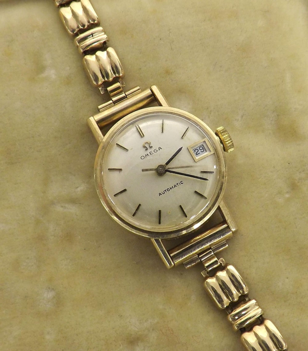 Omega automatic 9ct lady's bracelet watch, circa 1974, silvered dial with baton markers, sweep