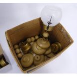 Three boxes containing reproduction candle clock parts, including glass globes, bases, stems and