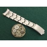 Rolex vintage wristwatch movement, 15 jewels, black dial, 28mm diameter; also a part Rolex Oyster