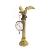 Decorative cast ormolu watch stand, modelled as an eagle upon a brass Corinthian column and circular