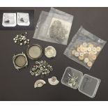 Interesting selection of watch parts principally Omega, to include two Omega stainless steel screw