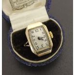 Novelty 9ct ring watch, the rectangular silvered dial with Arabic numerals, Swiss 15 jewel movement,