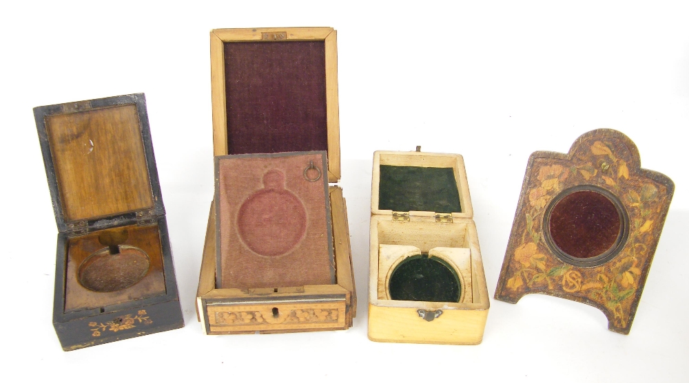 Mauchline Ware watch holder, the lid depicting Leas Lift at Folkestone; together with three