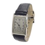 Omega 1920s rectangular silver gentleman's wristwatch, silvered dial with Arabic numerals and