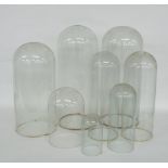 Eight various cylindrical glass domes (8)