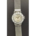 Levis platinum diamond set lady's wristwatch, the silvered dial with Arabic quarter numerals and