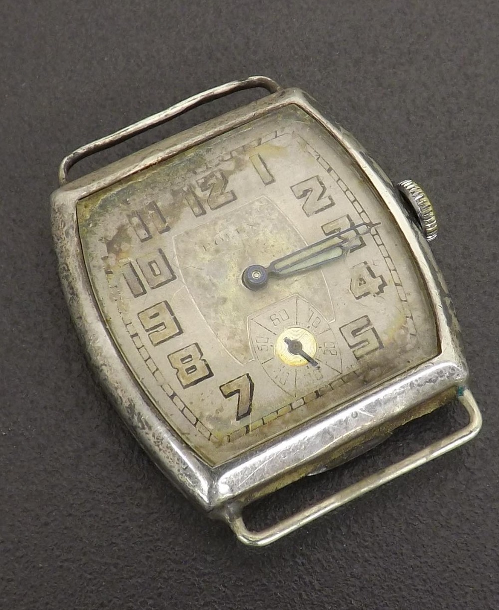 Rolex silver tonneau wire-lug wristwatch head, import hallmarks for Glasgow 1930, silvered dial with