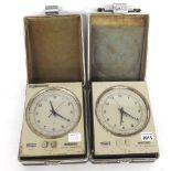 Two Seiko crystal marine chronometers, the 5.25" silvered dials within a metal casing and original