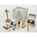 Small selection of various wrist and pocket watches; also a watch stand