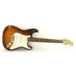 2002 Fender Stratocaster electric guitar, made in Mexico, ser. no. MZ2165291, iced tea burst finish,