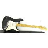 1987 Fender Stratocaster electric guitar, made in USA, ser. no. E417740, black finish with some