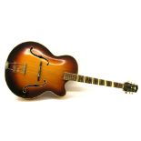 Vintage European archtop guitar, sunburst finish with typical wear for age, missing pickguard,