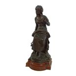 After Auguste Moreau - large cast bronze figure of a seated girl upon a red veined marble base,