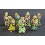 Collection of seven Chinese porcelain sages, 4.5" high (7)