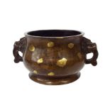 Chinese twin handled bronze and gold splash censer, embossed seal mark to base, 7.5" diameter