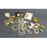 Collection of costume jewellery to include silver ingot pendant, mother of pearl bead necklaces,