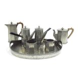 Sheffield planished pewter tea set and tray; together with two pewter coffee pots (7)