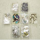 Eight boxes of various pieces of modern jewellery to include moonstone bracelets and earrings and