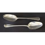 Pair of antique Old English silver table spoons, with the crest of an eagle engraved to the back