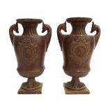 Pair of German ceramic twin handled vases, each centrally fitted with a cameo plaque and with