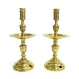 Pair of antique style brass candlesticks with drip trays, 10.5" high (alterations)