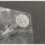 Platinum diamond octagonal cluster ring, set with nine round brilliant-cut diamonds, clarity SI,