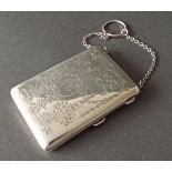 Early 20th century silver purse on chain, fitted with a leather interior, with pencil and mirror,