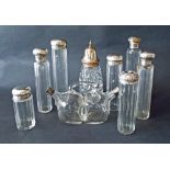 Collection of glass and silver scent and dressing bottles to include an interesting double spouted