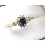 (1) Sapphire and diamond 9ct yellow gold cluster ring with set shoulders , ring size J-, boxed