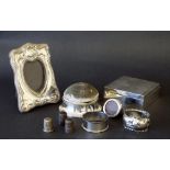 Mixed lot of small silver pieces to include a cigarette box with engine turned hinged lid, silver