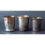 Three various Continental white metal beakers, 8oz approx (3)