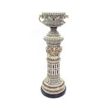 Impressive twin-handled jardiniere and stand in the manner of Doulton, fitted to a black marble