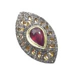 Large gem set and diamond marquise shaped dress cluster ring, the pear shaped centre stone in a