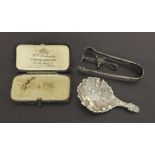 Victorian silver caddy spoon with embossed foliate decoration, Sheffield 1848, maker 'A.H', 3" long;