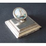 Interesting silver paperweight, fitted with a painted circular enamel of a sailing vessel, upon a