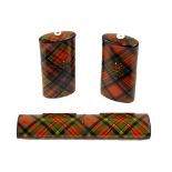 Tartan ware - two oval 'Go to Bed' match holders in the Caledonia and Stuart patterns, each 2.25";