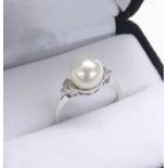 (2) 14ct white gold cultured pearl and diamond ring, round brilliant-cut, ring size K-, boxed