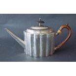 Attractive George III silver teapot of reeded panelled oval form engraved with floral bands, maker