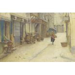 John Parker (1839-1915) - Study of a girl holding an umbrella walking through a French village,