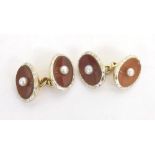 Pair of oval gold, enamel and cornelian cufflinks, each with single cultured pearls on a cornelian
