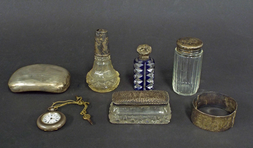 Mixed lot of silver to include a fob watch, engine turned hip shaped tobacco box, silver topped blue