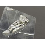 18ct white gold solitaire diamond ring with diamond set shoulders, round brilliant-cut, 1.50ct