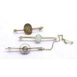 Two 15ct brooches; together with a further opal set gold brooch, 10.7gm (3)